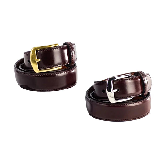 Two ALDEN SHOES MB 0918 - Alden 32mm Color 8 Shell Cordovan Belts are rolled up on a white background: one features a gold buckle (left), the other a silver buckle (right). Both are made in the USA.