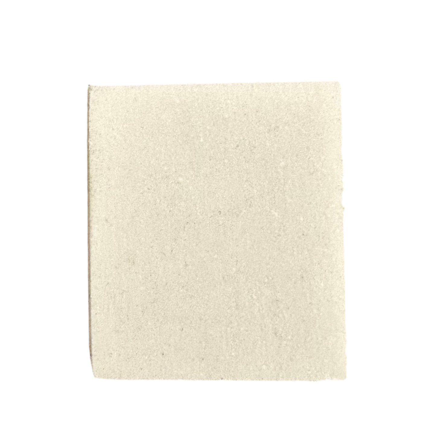 A plain, rectangular, off-white tile on a white background demonstrates how Alden Madison’s Saphir Suede Cleaner removes stains and restores the original finish.