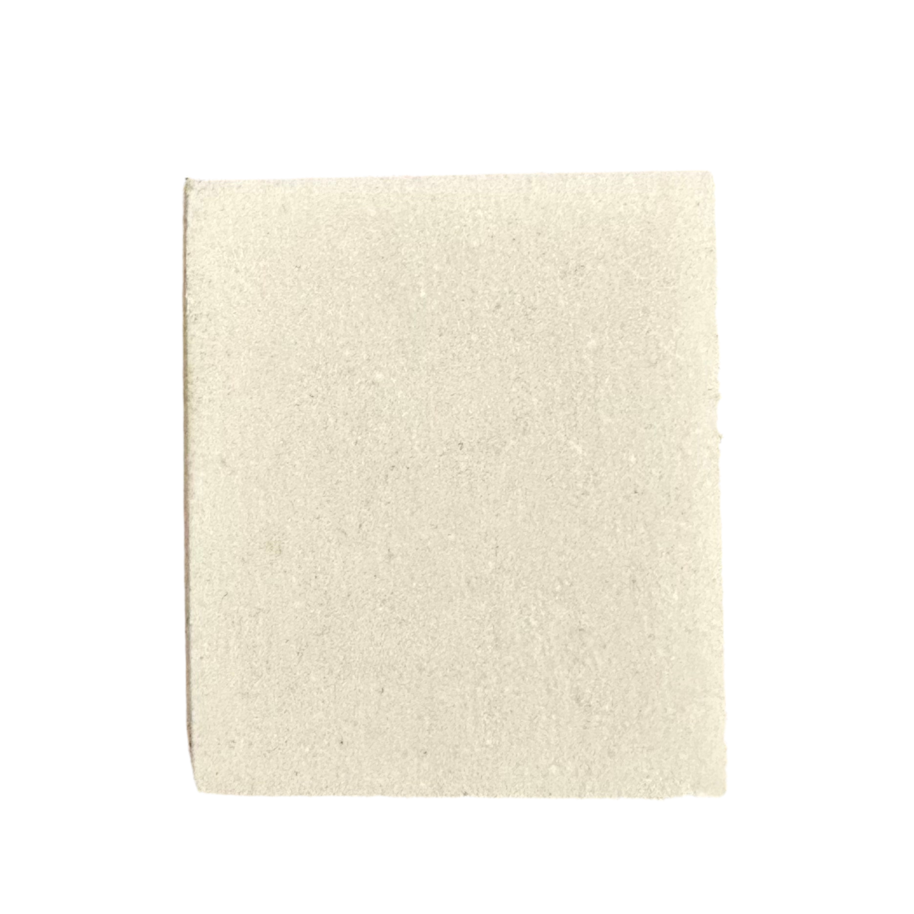 A plain, rectangular, off-white tile on a white background demonstrates how Alden Madison’s Saphir Suede Cleaner removes stains and restores the original finish.