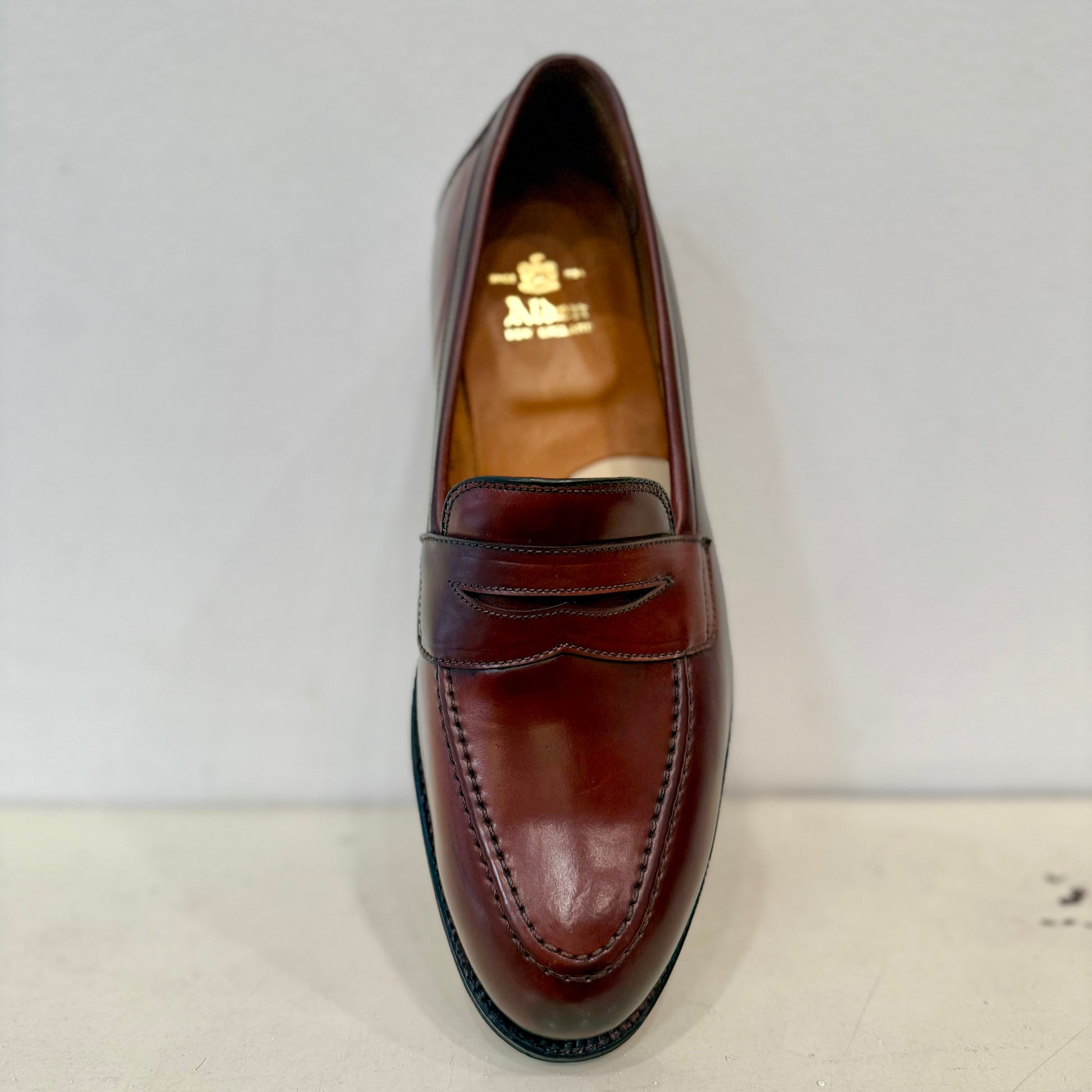 A single ALDEN SHOES 5750 - Higher Vamp "Midtown" Slip On in Color 8 is shown against a white background, highlighting its top and front views with visible stitching and branded insole.