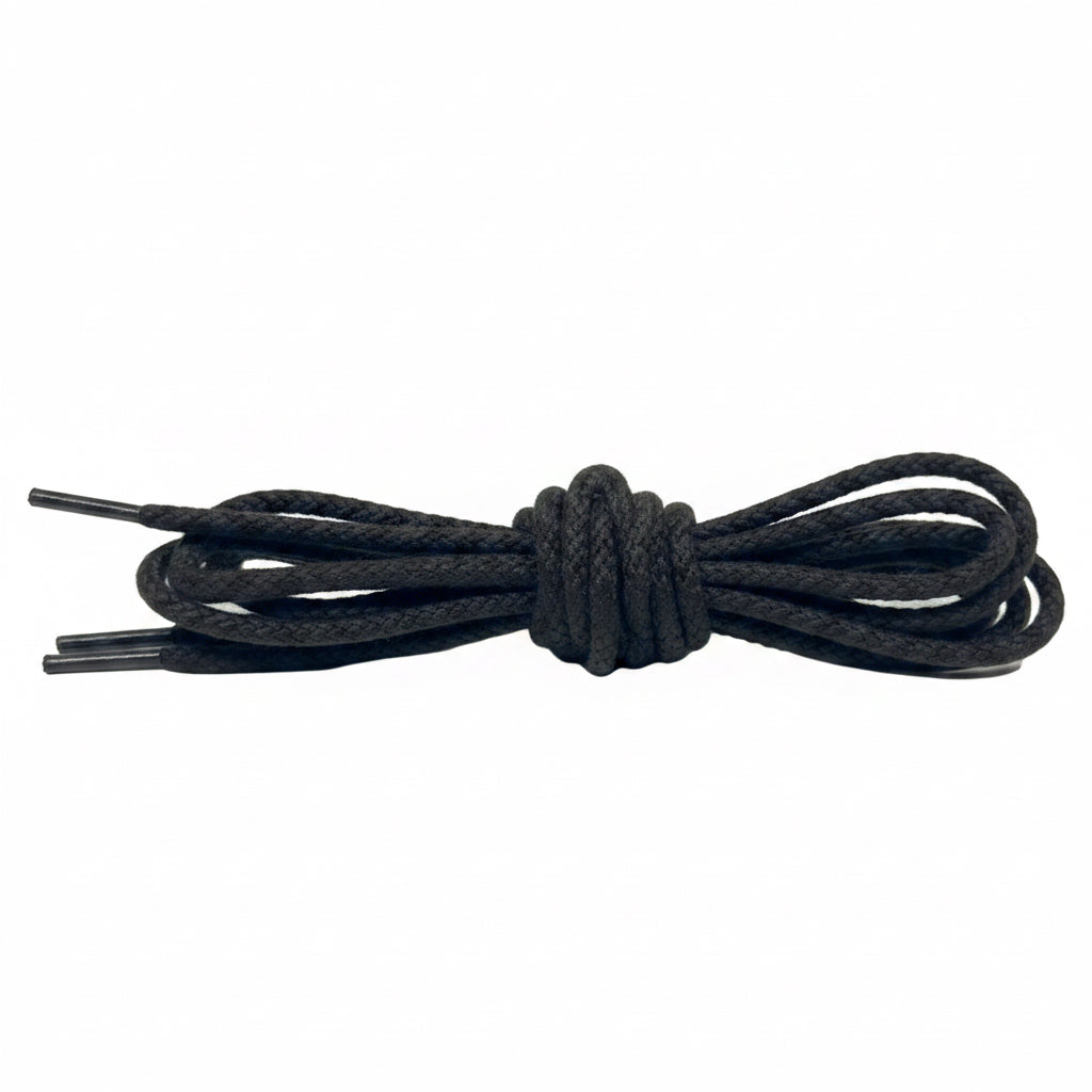 Alden Madison Laces - Round Soft Cotton Laces, 54 inches, black with plastic tips, shown coiled on a white background.