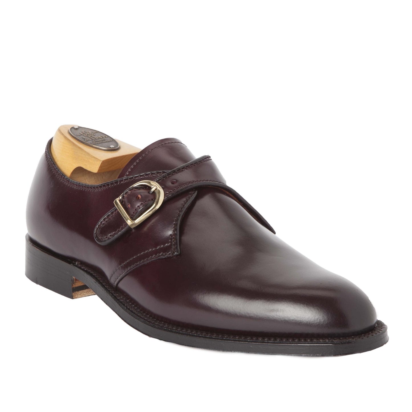 The Alden Madison 954 - Monk Strap Color 8 Shell Cordovan shoe features a polished dark brown leather with a single buckle on the side, crafted with sleek Aberdeen Last and a durable leather sole, presented on a white background.