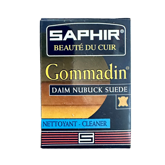 The Saphir Suede Cleaner by Alden Madison is your essential for removing stains from suede and nubuck. In blue, gold, and red packaging with Nettoyant - Cleaner text and a shoe illustration, it restores the original finish of your cherished footwear.
