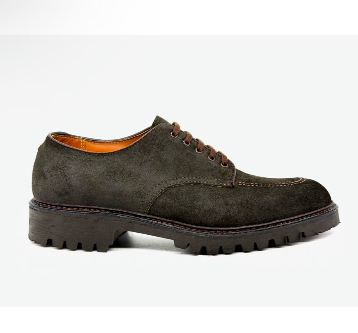 The ALDEN SHOES 4006 - Earth Reverse Indy Shoe Heavy Lug is a dark brown suede lace-up dress shoe, designed in the iconic Indy Shoe style with a substantial lug rubber sole and a rugged, thick treaded base, displayed in a side view against a plain white background.