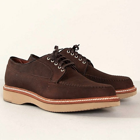 The ALDEN SHOES 73980 - Tobacco Chamois Ranger Mocc with Wedge features brown chamois leather, light tan wedge soles, and white stitching, shown against a plain light background.