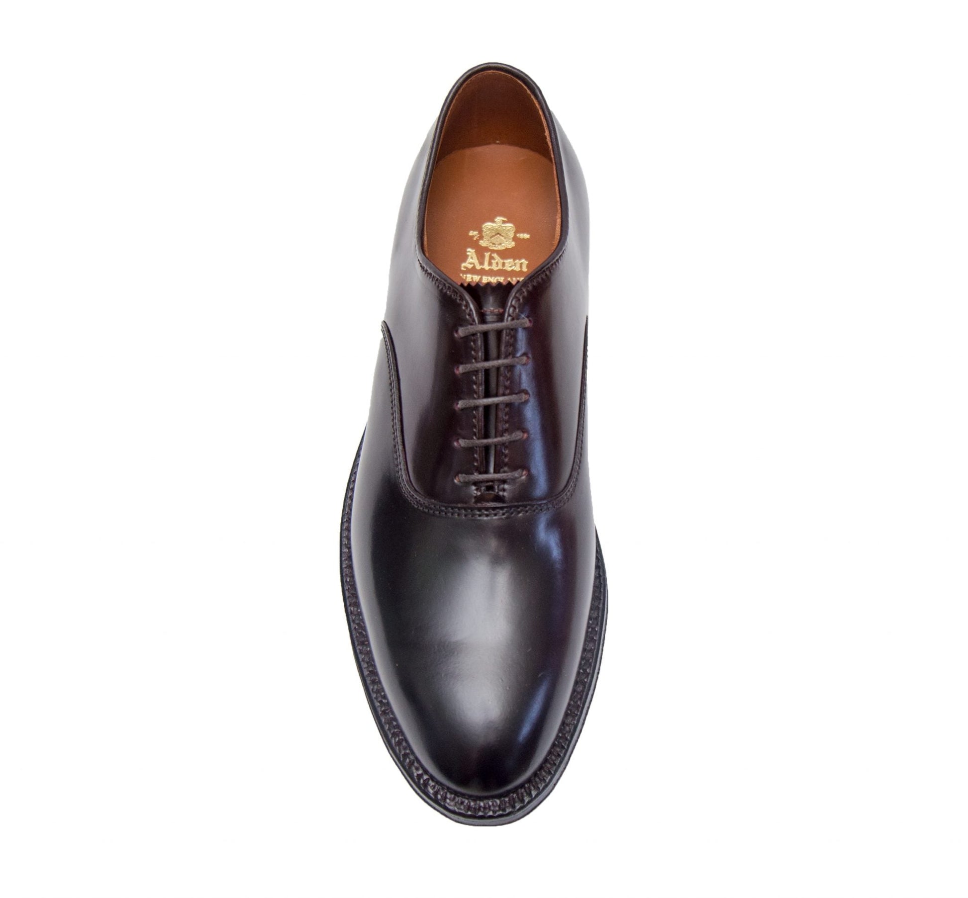 A top-down view of the Alden Madison 934 - Plain Toe Bal in Color 8 Shell, crafted on the Aberdeen last with a brown inner lining and visible laces, displayed against a white background.