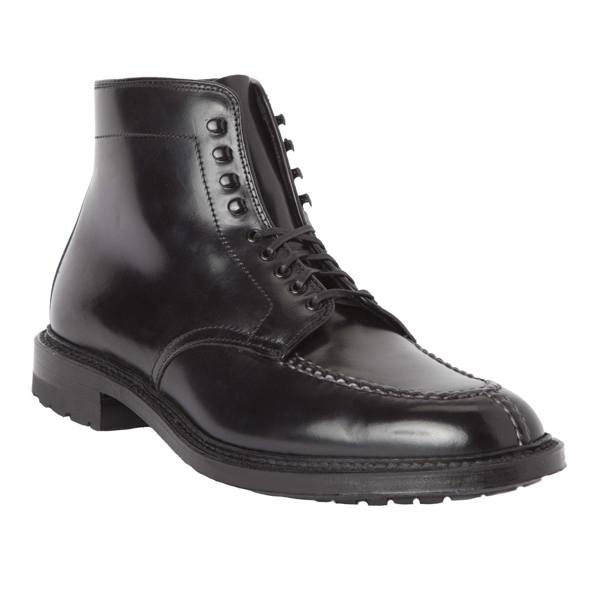 The Alden Madison 40219HC - NST Tanker Boot in Black Shell Cordovan is a black polished leather ankle boot with laces, eyelets, and a durable commando sole, showcasing its stitching and rugged construction.