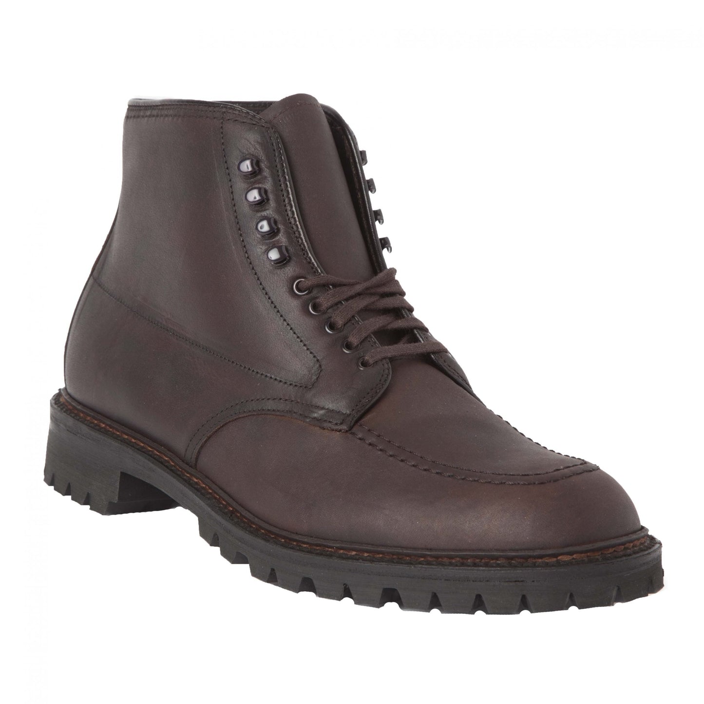 Alden Madisons 404 - Indy Boot in Kudu features a sleek brown leather design with a vibrant black Vibram lug outsole, lace-up front, and metal eyelets against a white background, showcasing detailed stitching around the toe.
