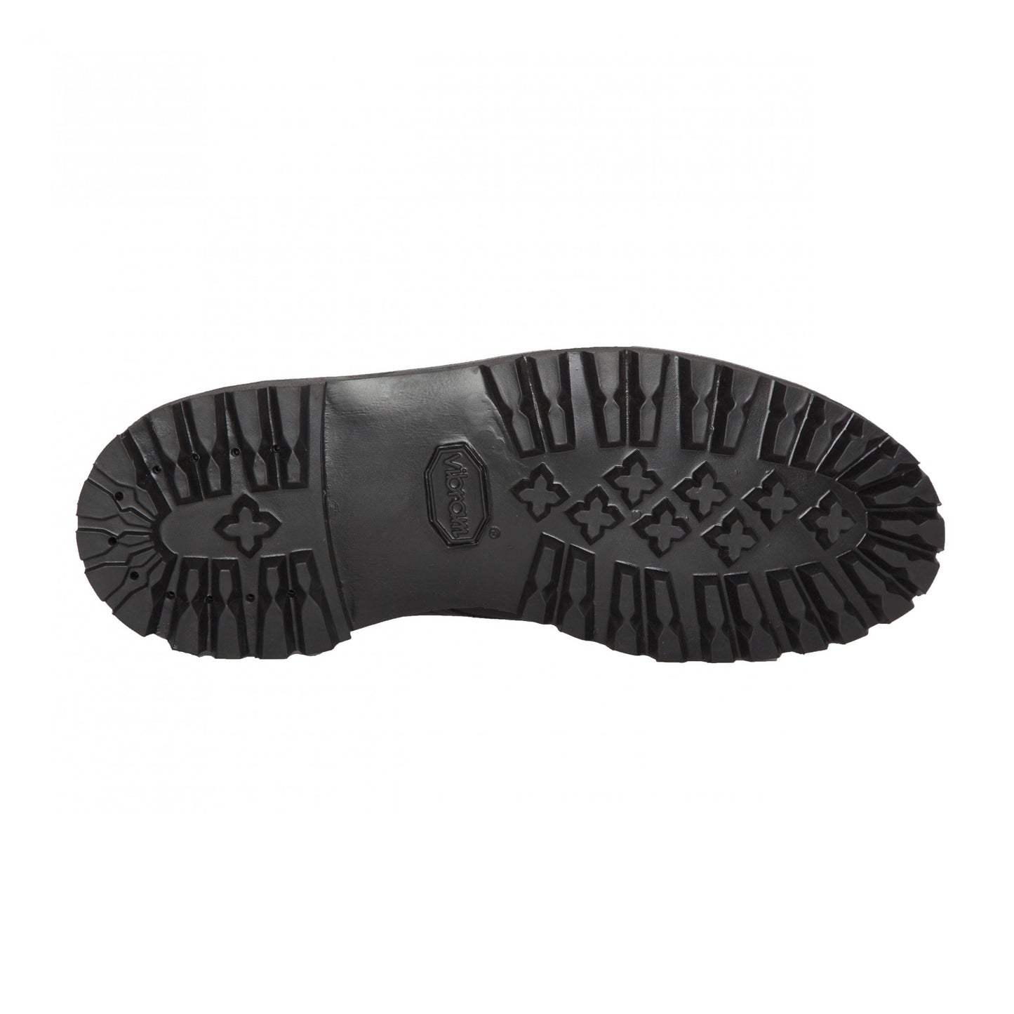 The D9916H - Indy Boot in Earth Reverse Chamois by Alden Madison features a black rubber sole with a rugged Vibram Heavy Lug Outsole, designed for traction with various grooves and raised sections. It includes a diamond-shaped logo area at the center and cross shapes throughout the sole.