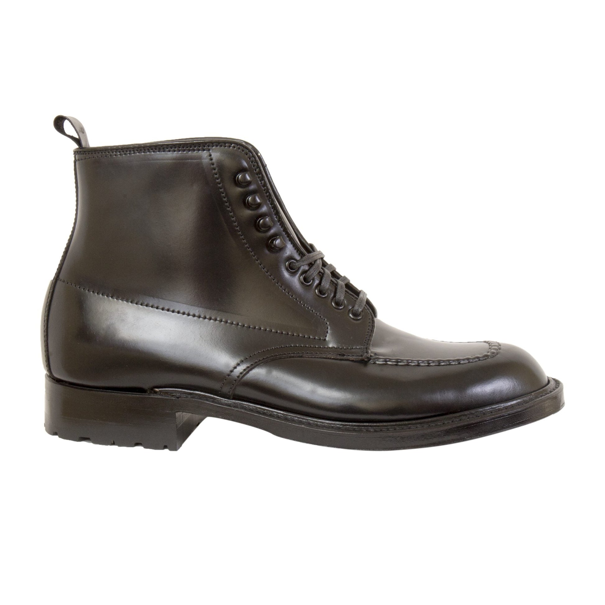 The Alden Madison 40509HC - Indy Boot w Commando in black shell is a polished leather ankle boot on the TrueBalance Last. It has a rounded toe, laces, low heel, and rear loop for easy handling, showcased against a plain white background.
