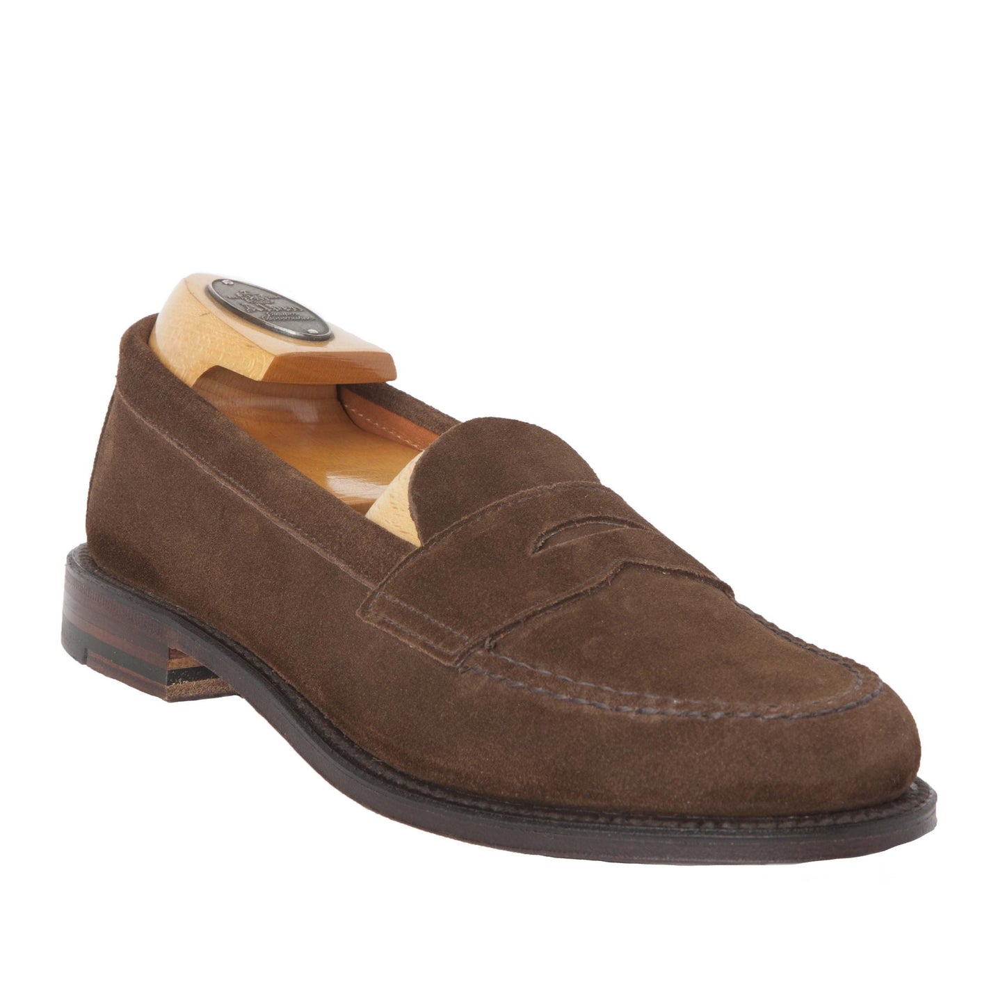 Alden Madisons 6245F - Unlined Leisure Hand Sewn in Brown Suede showcases a classic penny slot design and fine hand stitching. It features a wooden shoe tree, low heel, and durable flex leather sole.