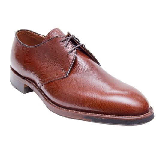 The 942C - 3 Eye Dutton in Brown Alpine Grain by Alden Madison is a single brown calfskin dress shoe, rounded toe, thin black laces, low heel, smooth finish, crafted on the Hampton Last and shown isolated on a white background.