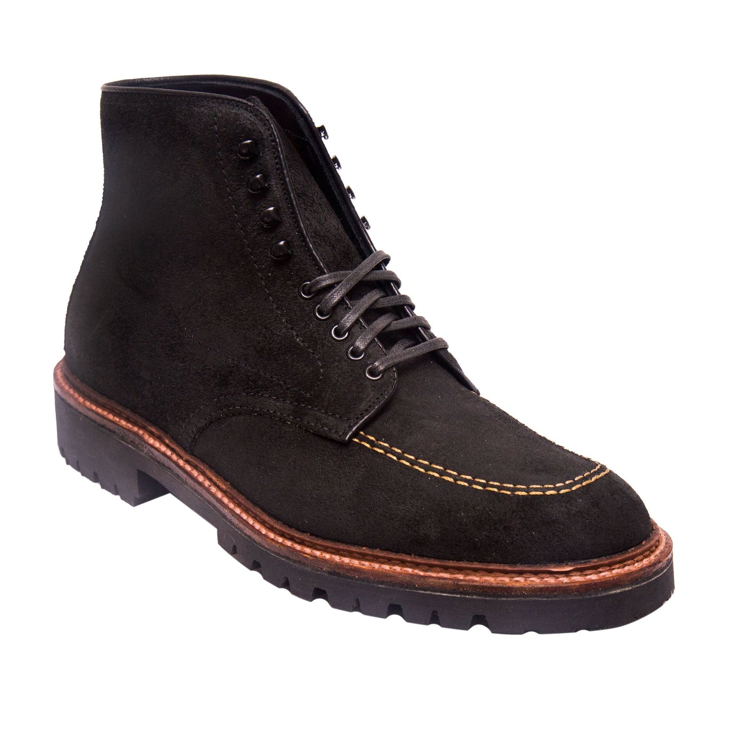 The Alden Madison D9916H - Indy Boot in Earth Reverse Chamois features a black suede ankle design with black laces, brown welt, and stitching details. It is equipped with a rugged Vibram Heavy Lug Outsole, offering both style and durability.