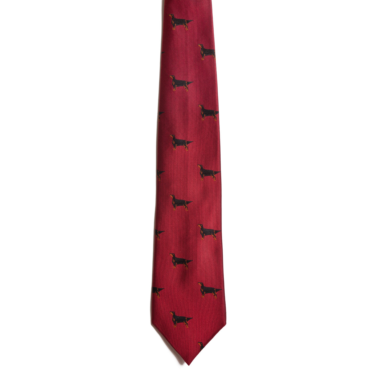 Alden Madisons Gordon Setter red necktie is made of 100% silk, featuring a jacquard pattern with small black dog illustrations and Gordon Setter motifs on a white background.