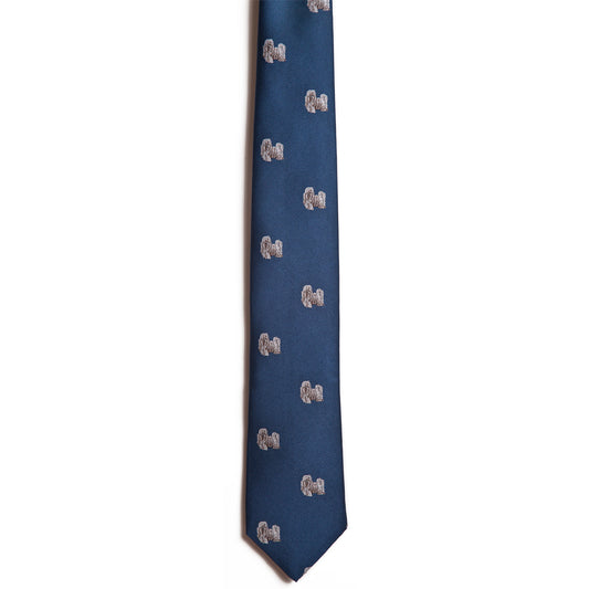 The Alden Madison Shih Tzu necktie is navy blue silk jacquard, featuring a repeating pattern of small, light-colored Shih Tzu illustrations on the fabric against a plain white background.